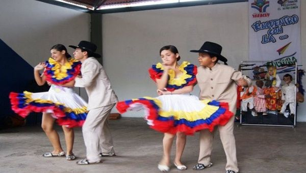 People dance a Joropo song, Venezuela.